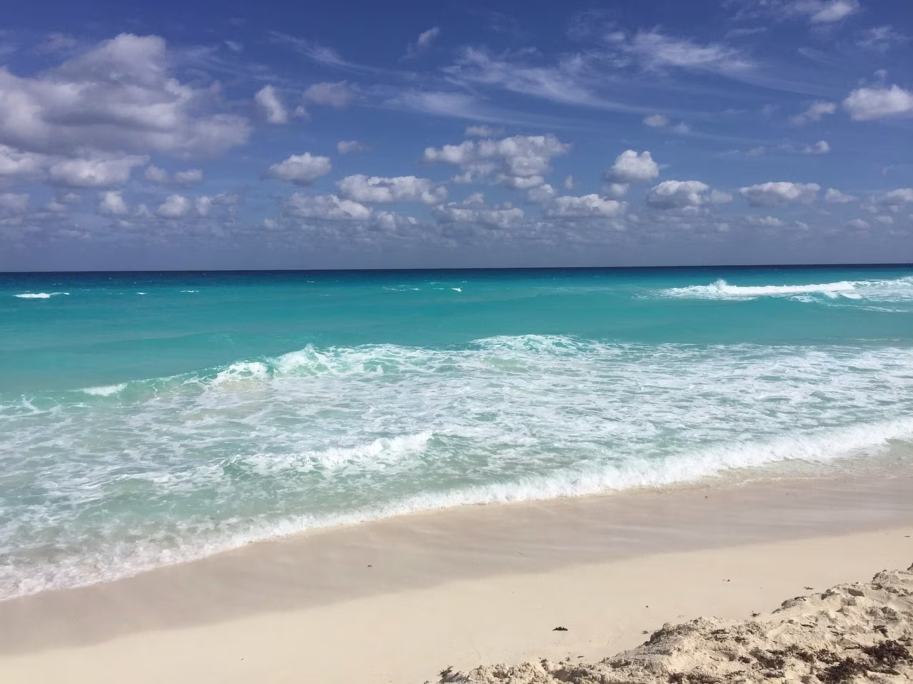 Cancun turquoise Caribbean waters - escape Vancouver rain by private jet